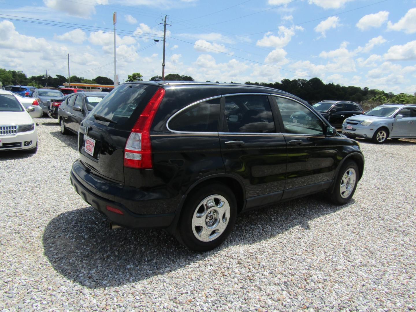 2009 Black /Gray Honda CR-V LX 2WD 5-Speed AT (5J6RE38369L) with an 2.4L L4 DOHC 16V engine, Automatic transmission, located at 15016 S Hwy 231, Midland City, AL, 36350, (334) 983-3001, 31.306210, -85.495277 - Photo#7